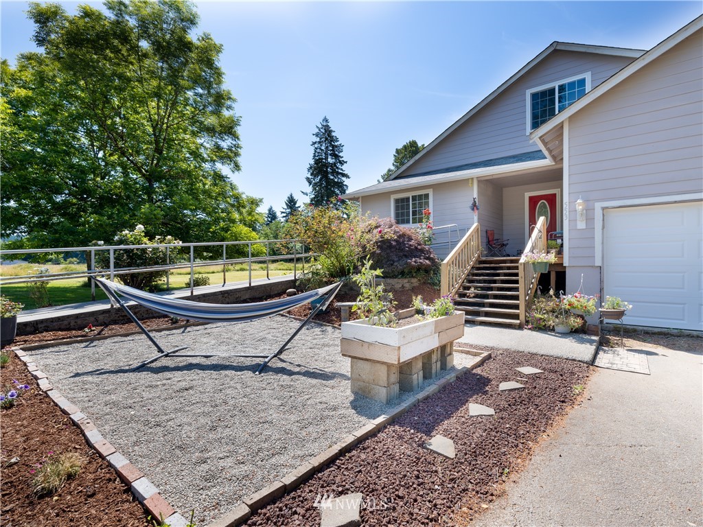553 River Road Chehalis, WA 98532 - Photo 1 of 22 a view of a backyard with sitting area