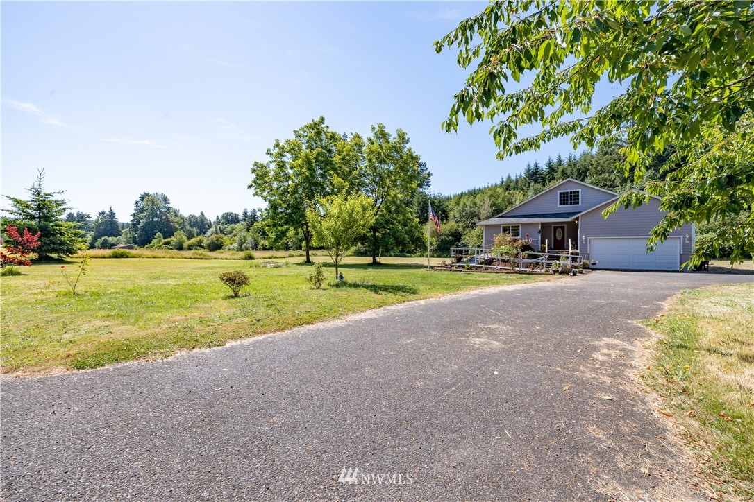 553 River Road Chehalis, WA 98532 - Photo 19 of 22 a view of a park with large trees