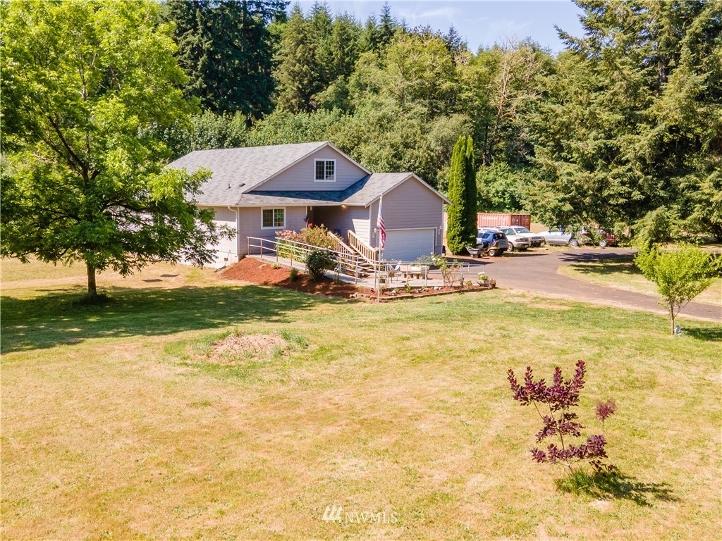 553 River Road Chehalis, WA 98532 - Photo 3 of 22 a view of a house with yard and sitting area