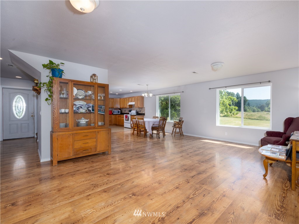 553 River Road Chehalis, WA 98532 - Photo 6 of 22 a view of a work space with furniture and wooden floor