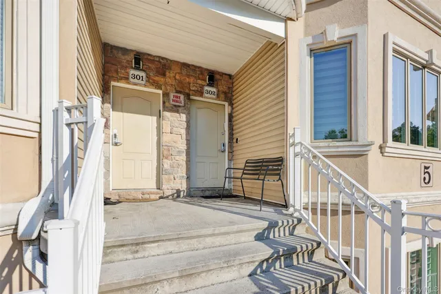 a view of an entryway with staircase