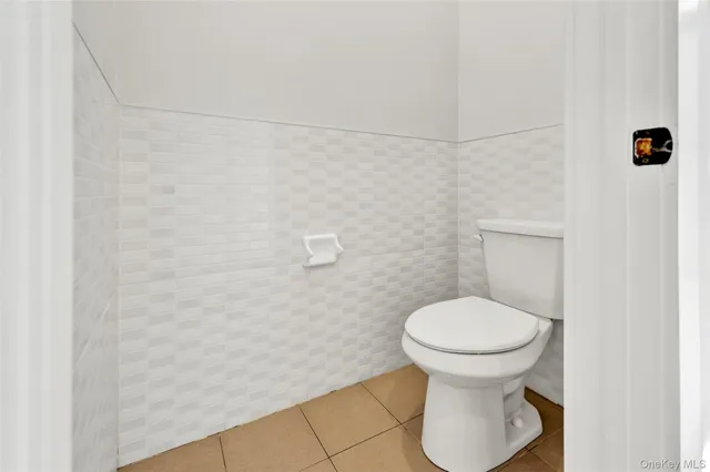 a bathroom with a toilet and a sink