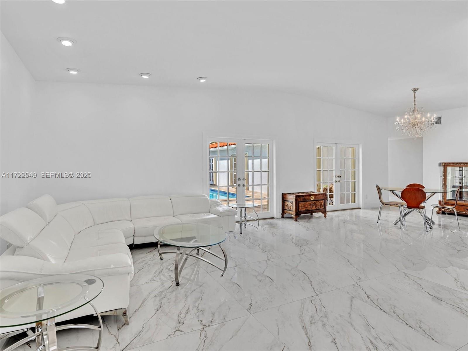 12904 Banyan Road North Miami, FL 33181 - Photo 11 of 87 a living room with furniture and a table