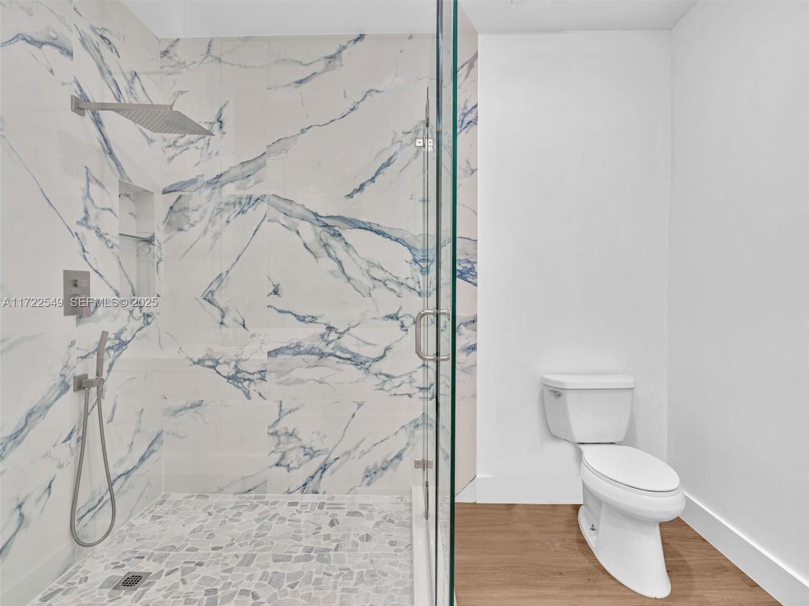 12904 Banyan Road North Miami, FL 33181 - Photo 71 of 87 a bathroom with a toilet and shower