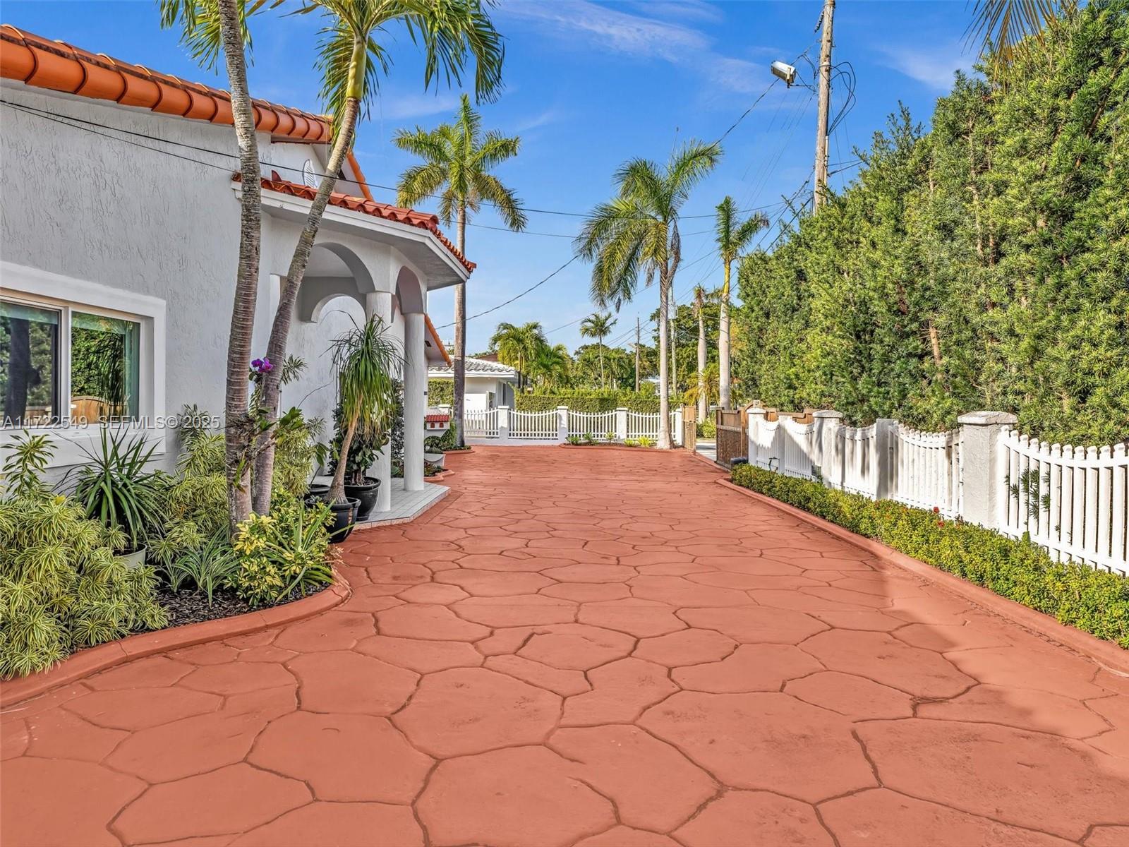 12904 Banyan Road North Miami, FL 33181 - Photo 84 of 87 a view of a garden with palm trees