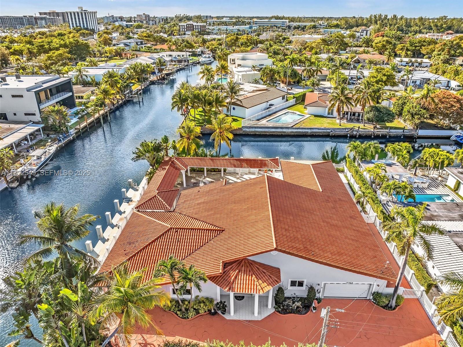 12904 Banyan Road North Miami, FL 33181 - Photo 85 of 87 an aerial view of residential houses with outdoor space