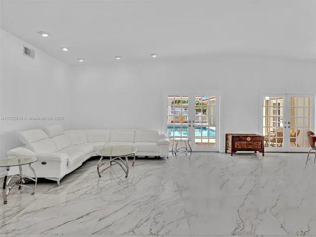 a view of a bathroom with a sink and a shower