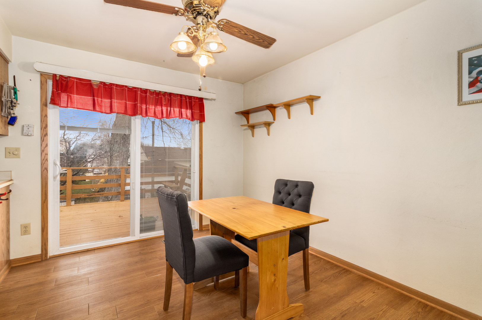 620 West Romeo Road Romeoville, IL 60446 - Photo 4 of 16 a view of a dining room with furniture window and wooden floor
