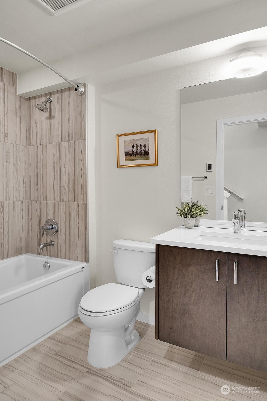 1907 25th Avenue South, Unit A Seattle, WA 98144 - Photo 11 of 23 a bathroom with a sink toilet a mirror and shower