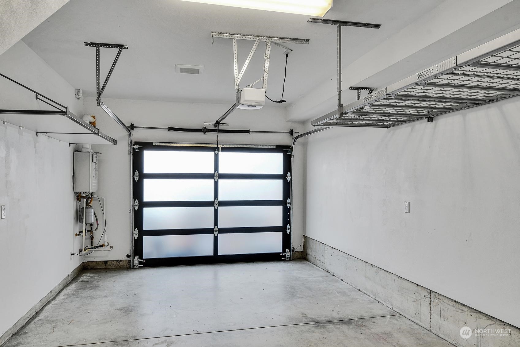 1907 25th Avenue South, Unit A Seattle, WA 98144 - Photo 12 of 23 a view of a room with racks on the wall