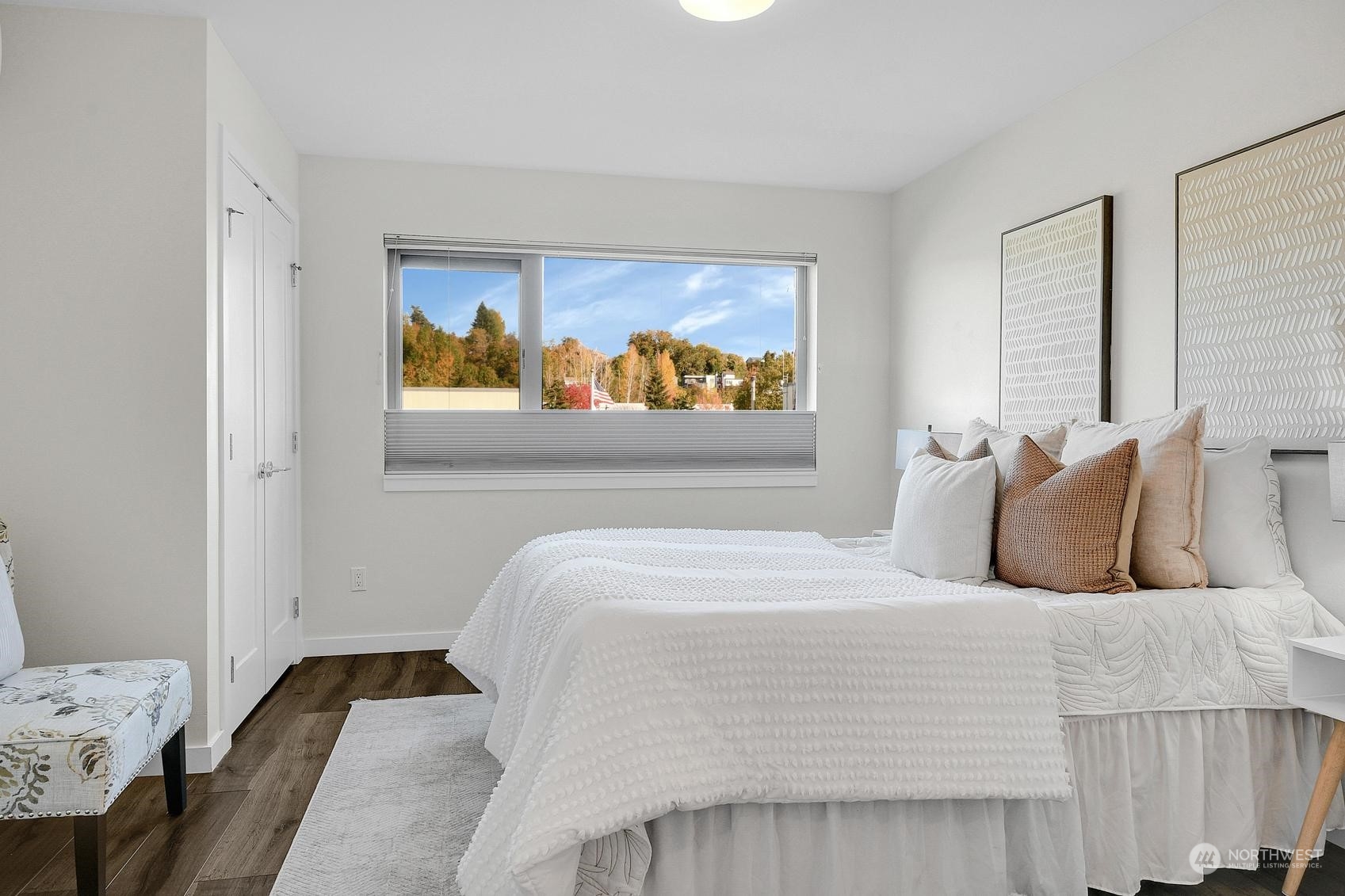 1907 25th Avenue South, Unit A Seattle, WA 98144 - Photo 13 of 23 a bedroom with a bed and a window