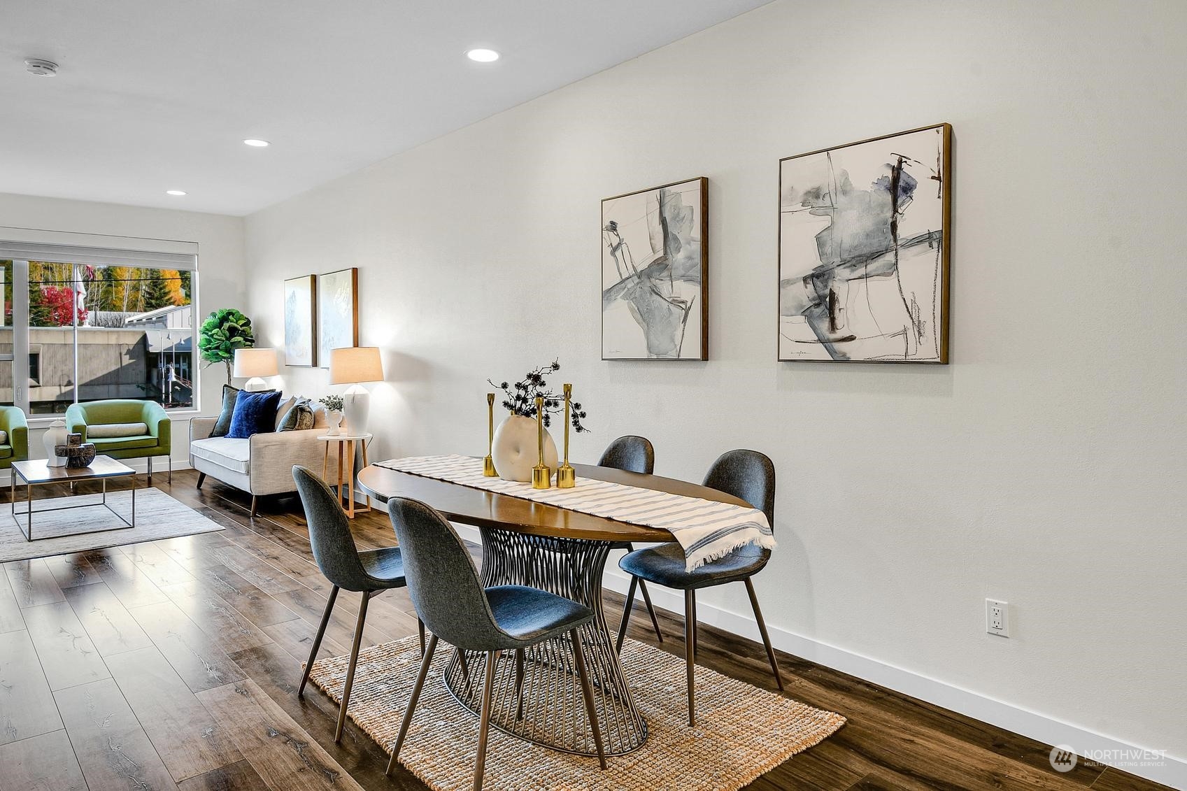 1907 25th Avenue South, Unit A Seattle, WA 98144 - Photo 7 of 23 a view of a dining room with furniture and wooden floor