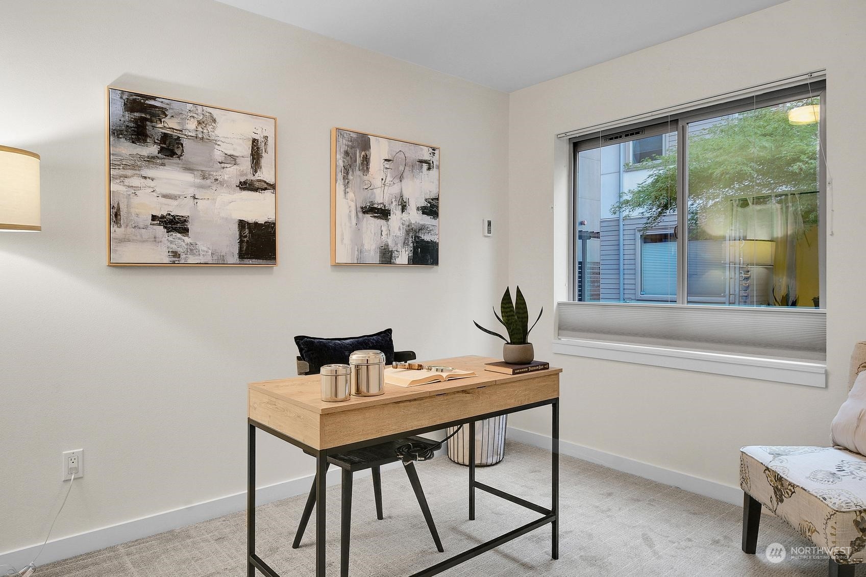 1907 25th Avenue South, Unit A Seattle, WA 98144 - Photo 10 of 23 a view of a workspace with furniture and a window