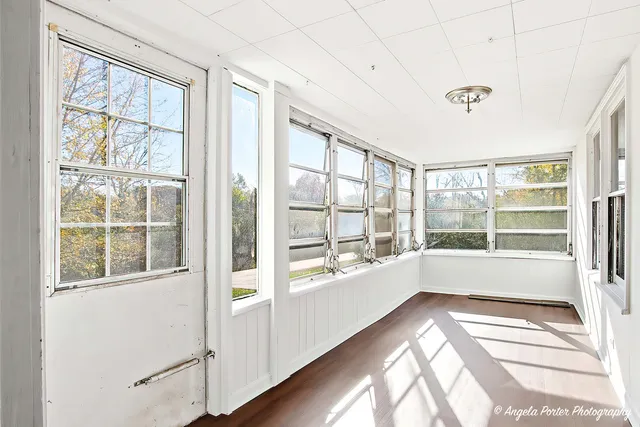 a view of an empty room with a window