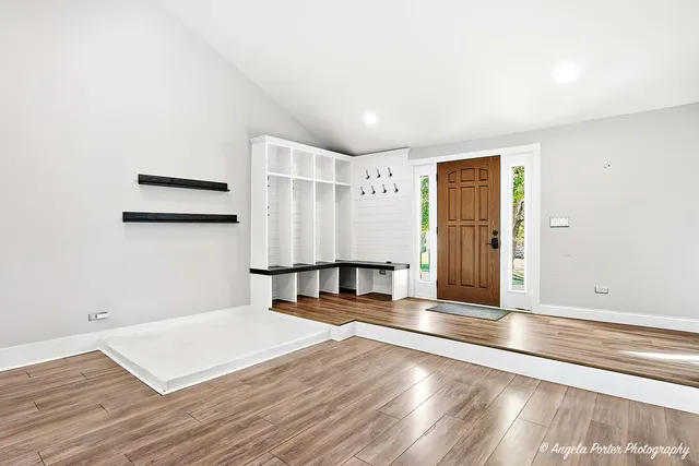 a view of a livingroom with wooden floor