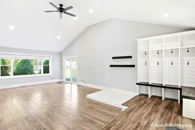 a view of a livingroom with a furniture wooden floor and window