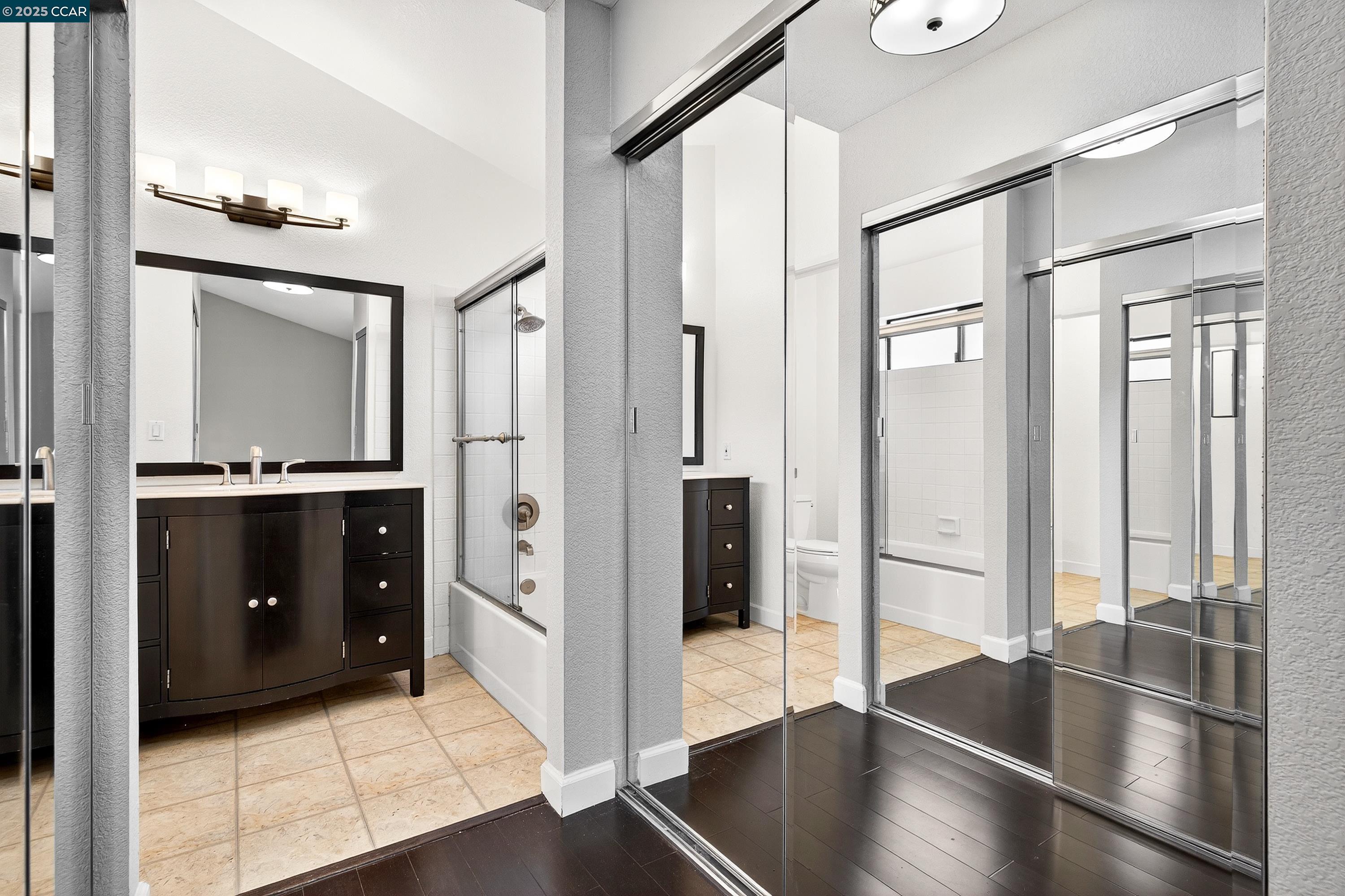 1202 Devonwood Hercules, CA 94547 - Photo 25 of 46 a view of a hallway with windows and chandelier