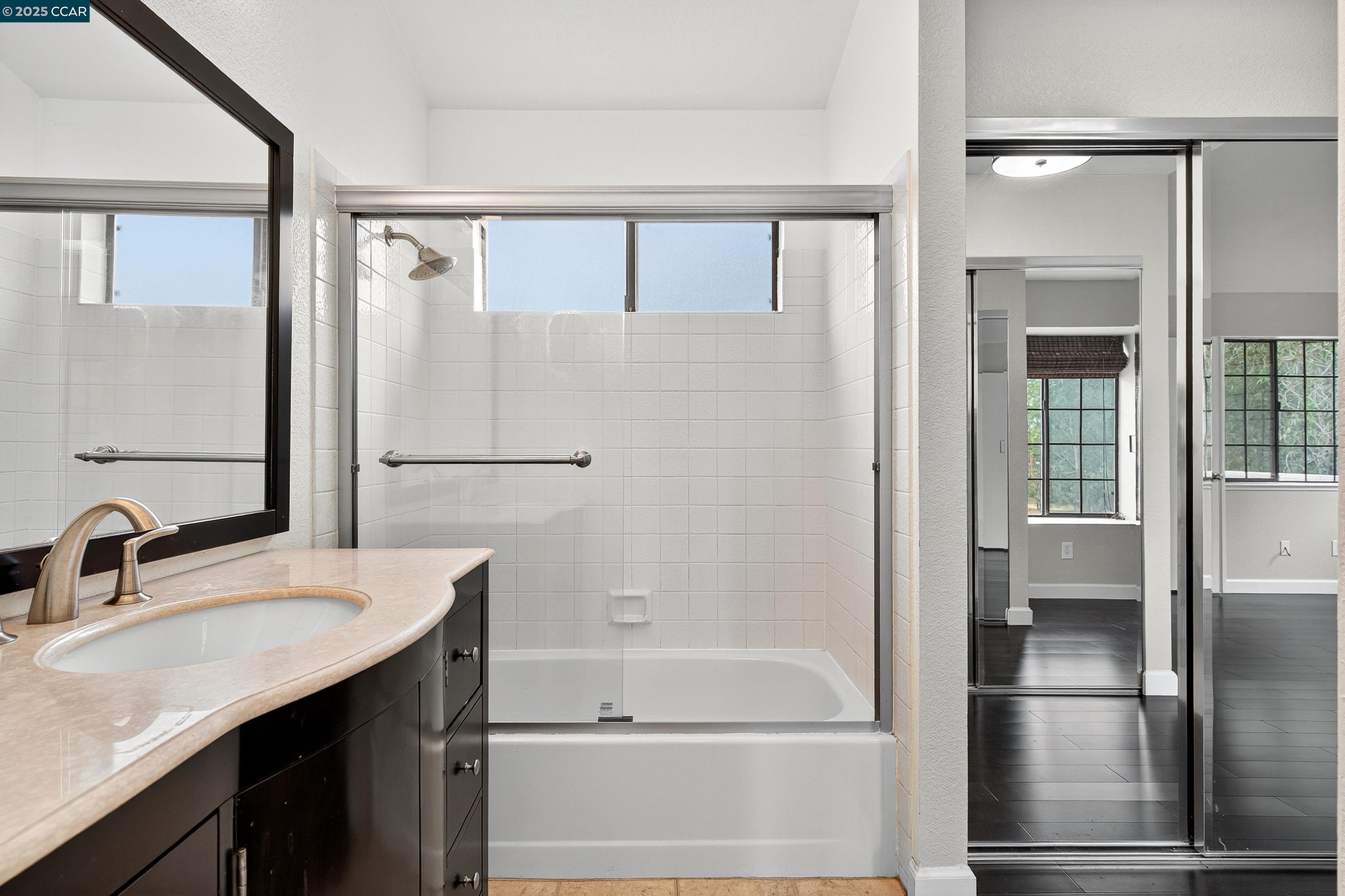 1202 Devonwood Hercules, CA 94547 - Photo 26 of 46 a bathroom with a bathtub and a sink
