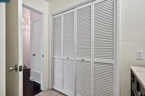 a view of a room with windows