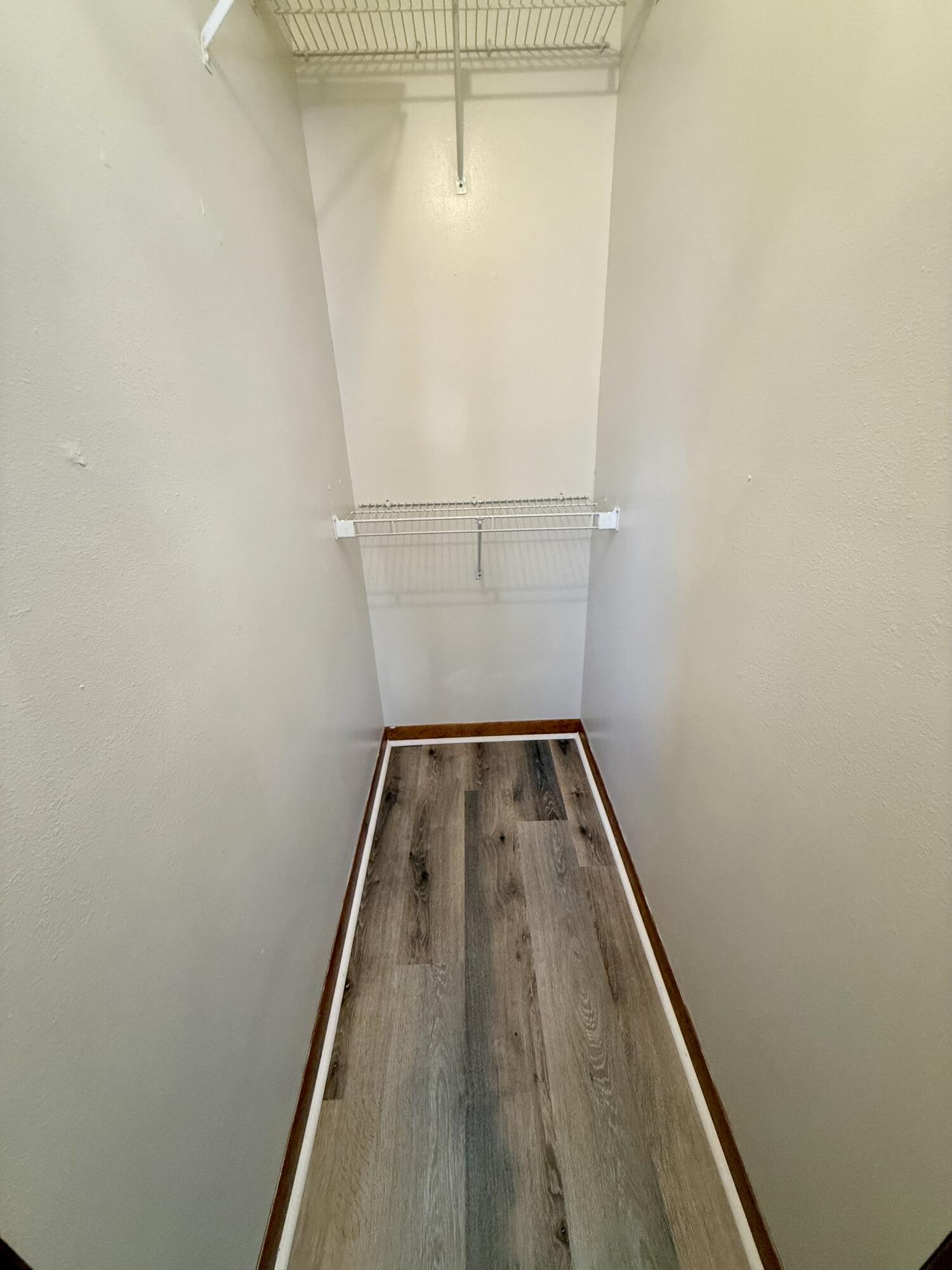 134 Alder Avenue Southeast Fort Walton Beach, FL 32548 - Photo 11 of 15 a view of a hallway with wooden floor