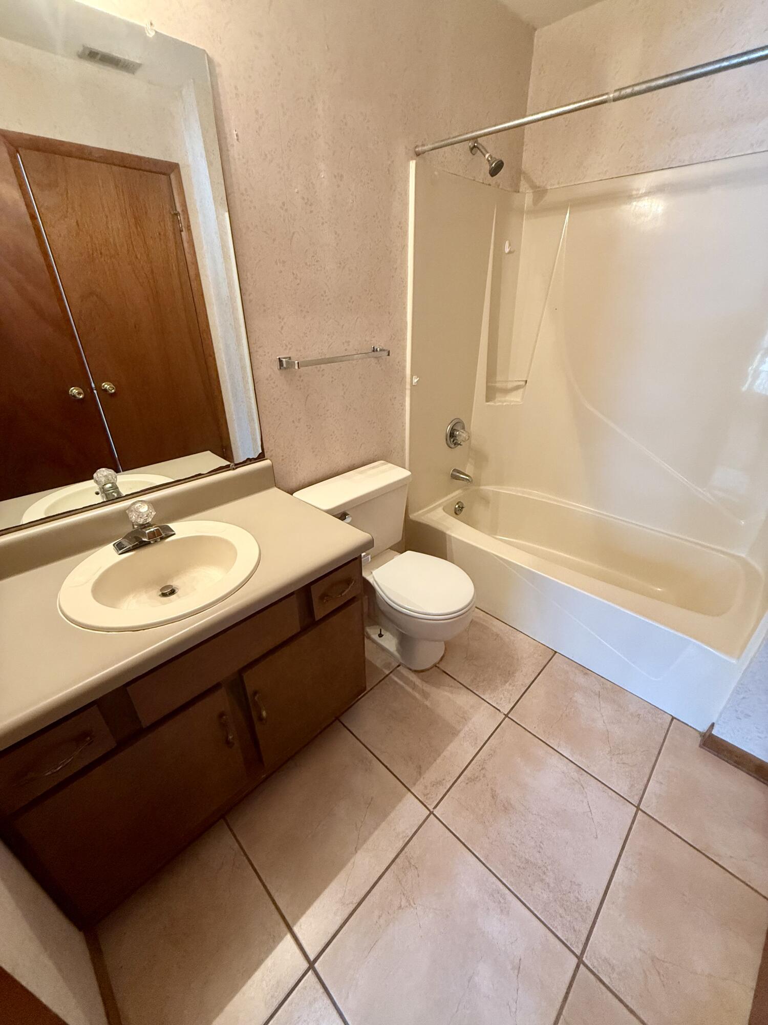 134 Alder Avenue Southeast Fort Walton Beach, FL 32548 - Photo 14 of 15 a bathroom with a sink a toilet and shower