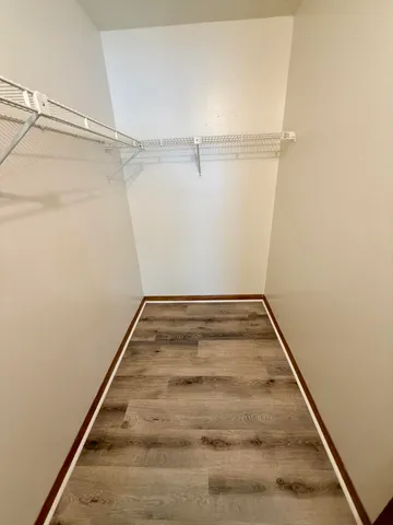 a view of a room with racks on the wall