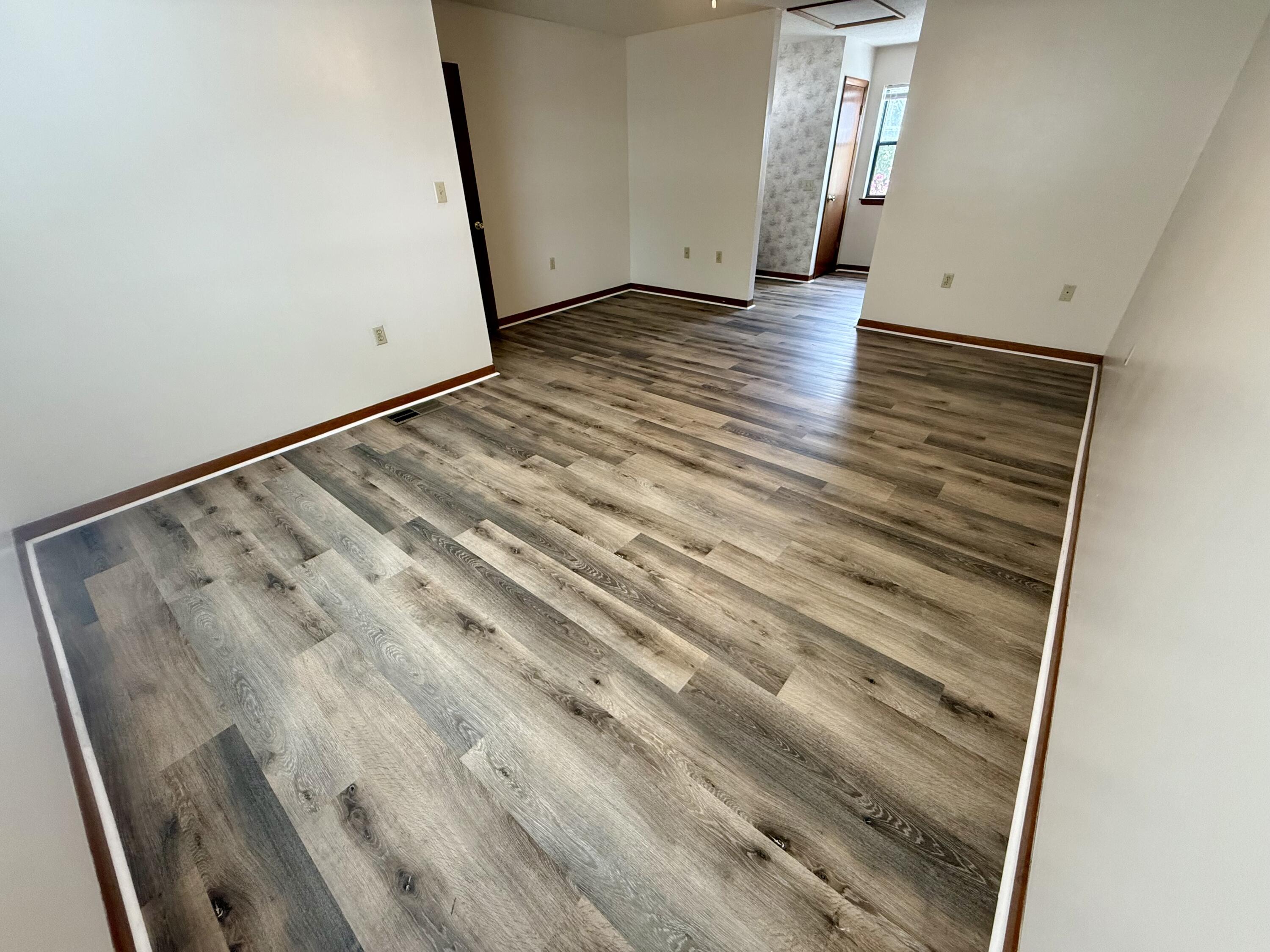 134 Alder Avenue Southeast Fort Walton Beach, FL 32548 - Photo 8 of 15 a view of room with wooden floor