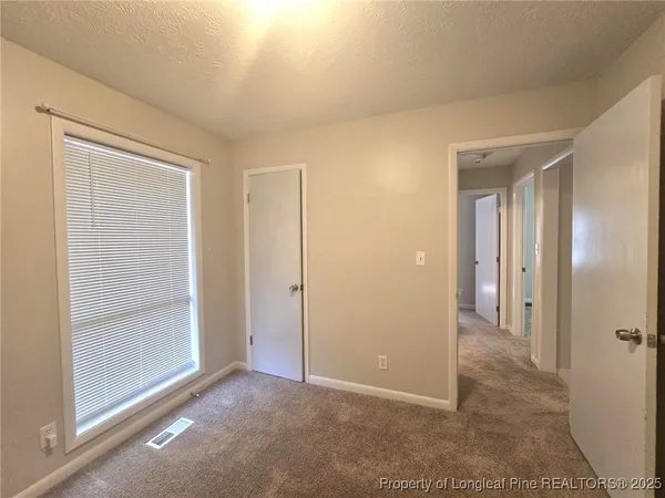 a view of entryway with a hallway