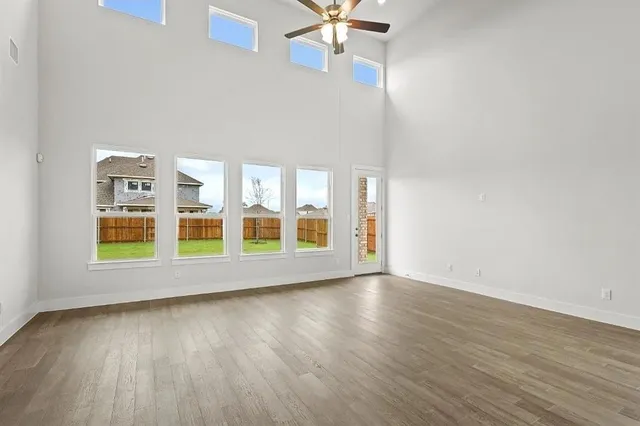 a view of kitchen and wooden floor