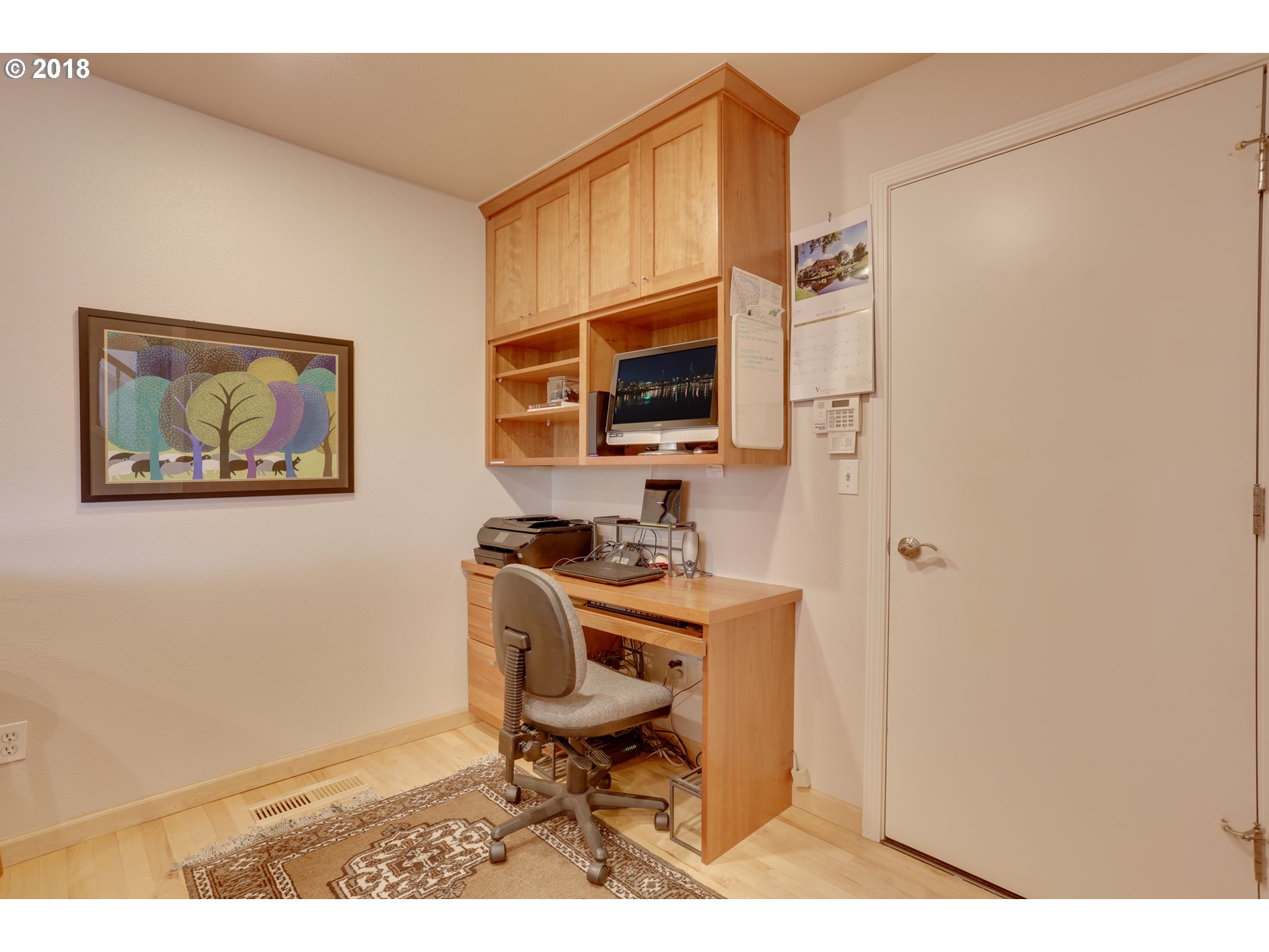 5209 Southwest View Point Terrace Portland, OR 97239 - Photo 23 of 32 a workspace with furniture and a window