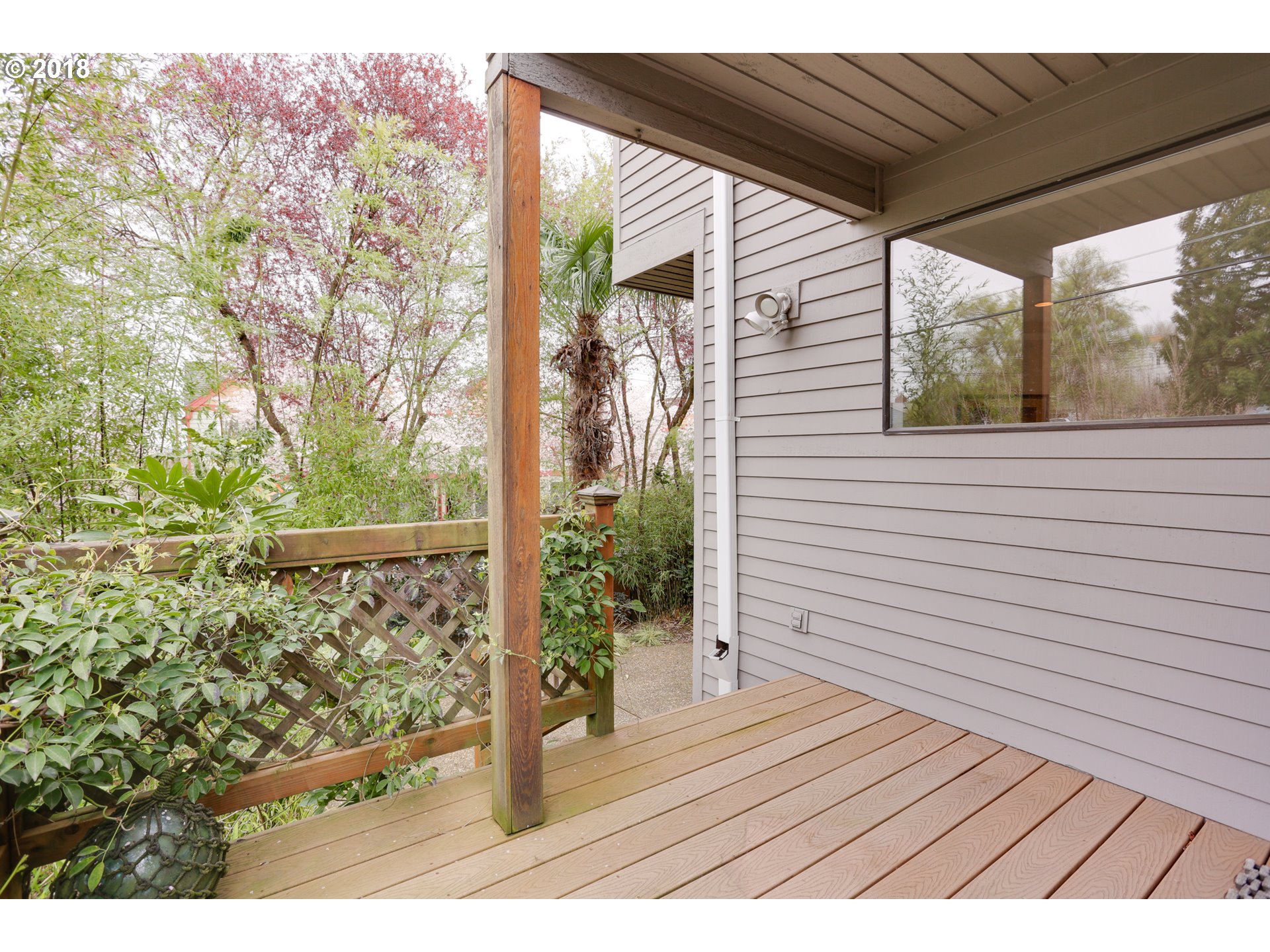 5209 Southwest View Point Terrace Portland, OR 97239 - Photo 25 of 32 a view of a balcony with wooden floor