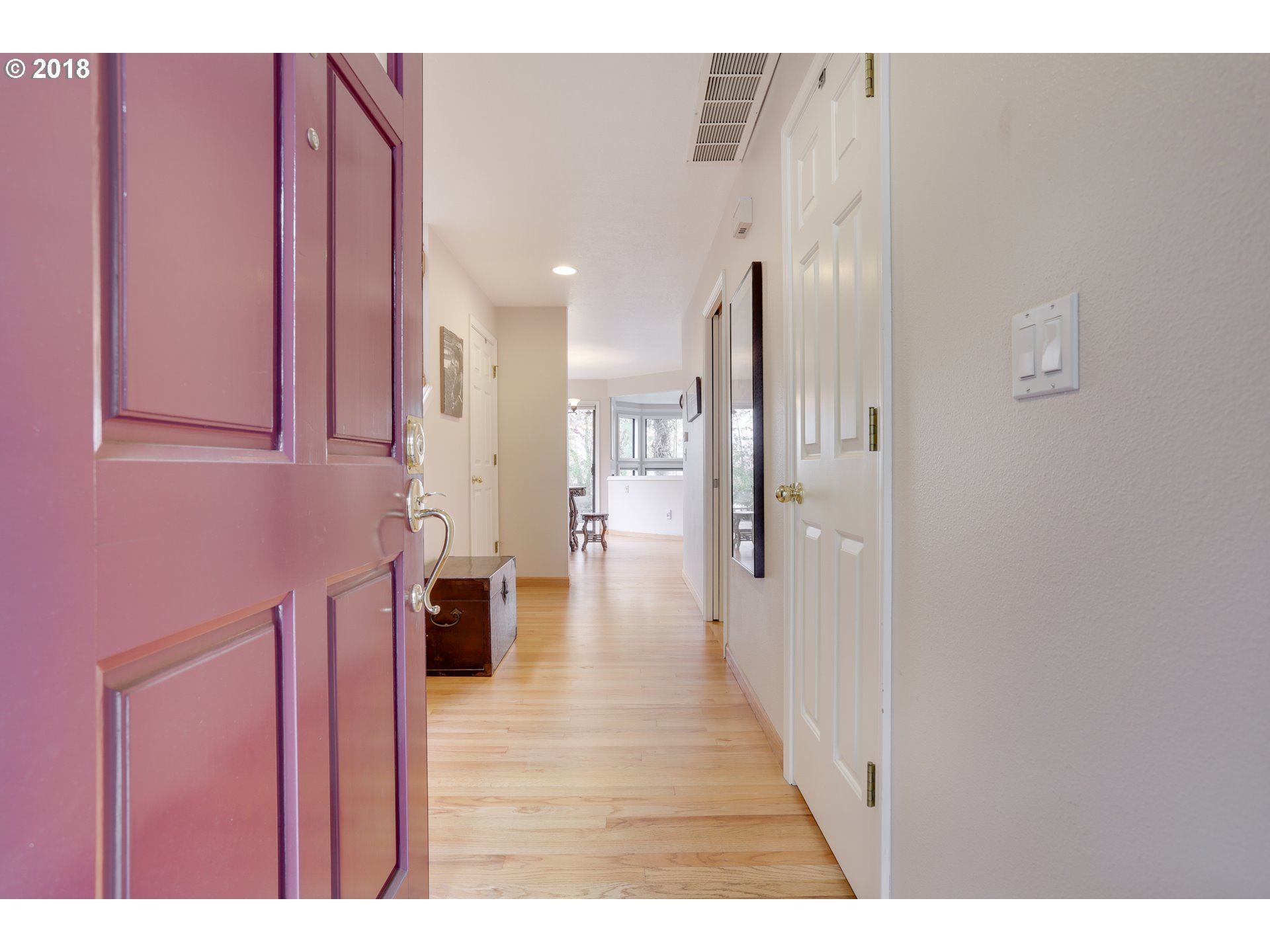 5209 Southwest View Point Terrace Portland, OR 97239 - Photo 3 of 32 a view of a hallway with wooden floor
