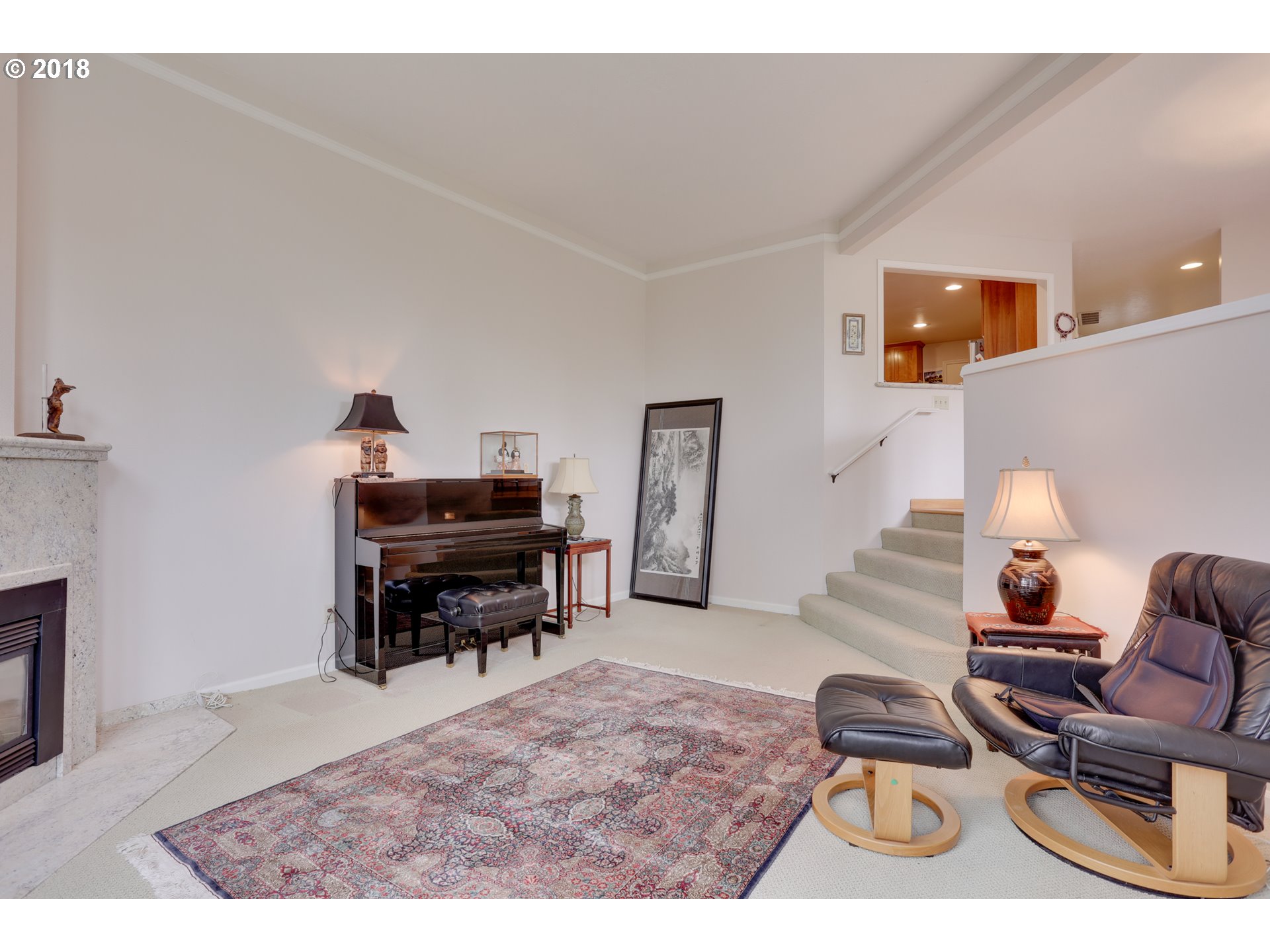 5209 Southwest View Point Terrace Portland, OR 97239 - Photo 6 of 32 a living room with furniture and a piano