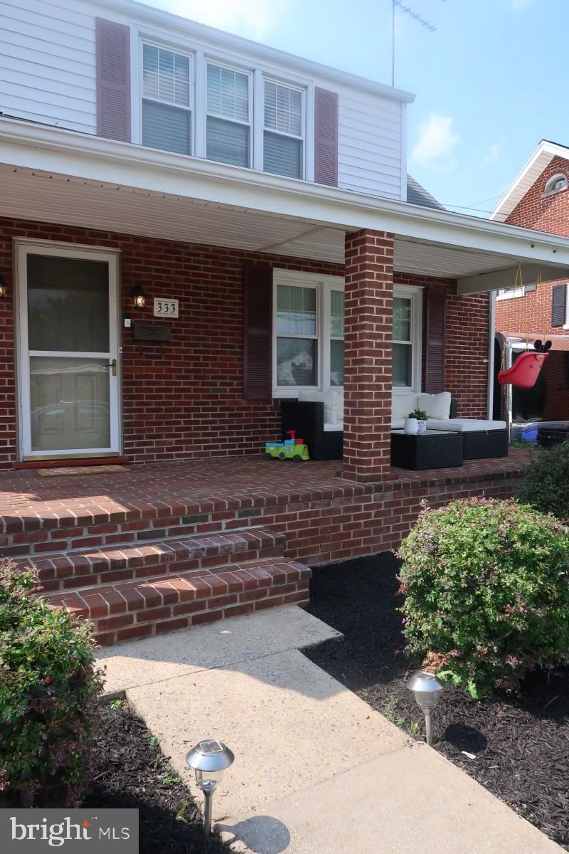 333 Devonshire Road Hagerstown, MD 21740 - Photo 3 of 33 a front view of a house with a yard