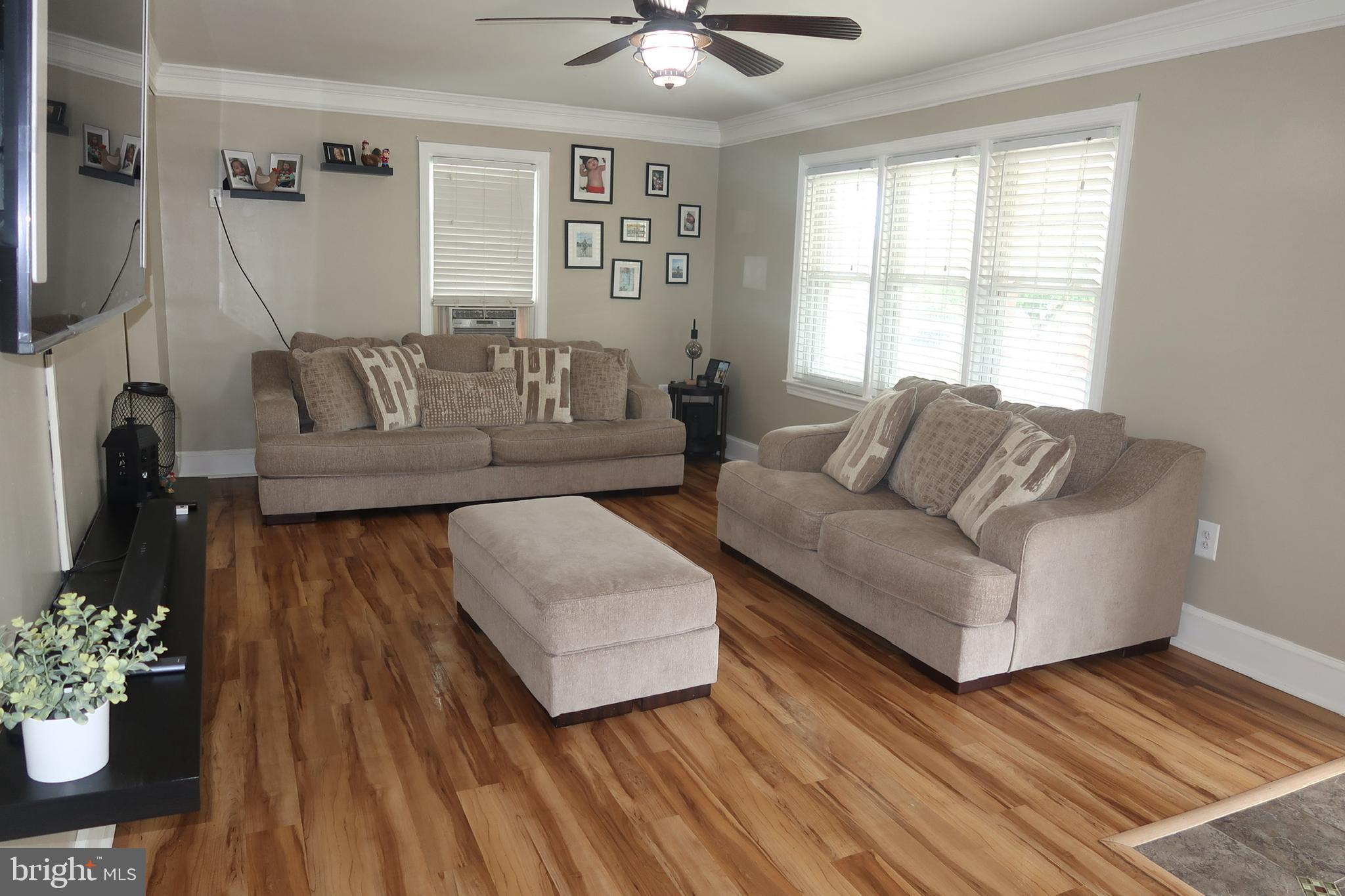 333 Devonshire Road Hagerstown, MD 21740 - Photo 7 of 33 a living room with furniture and wooden floor