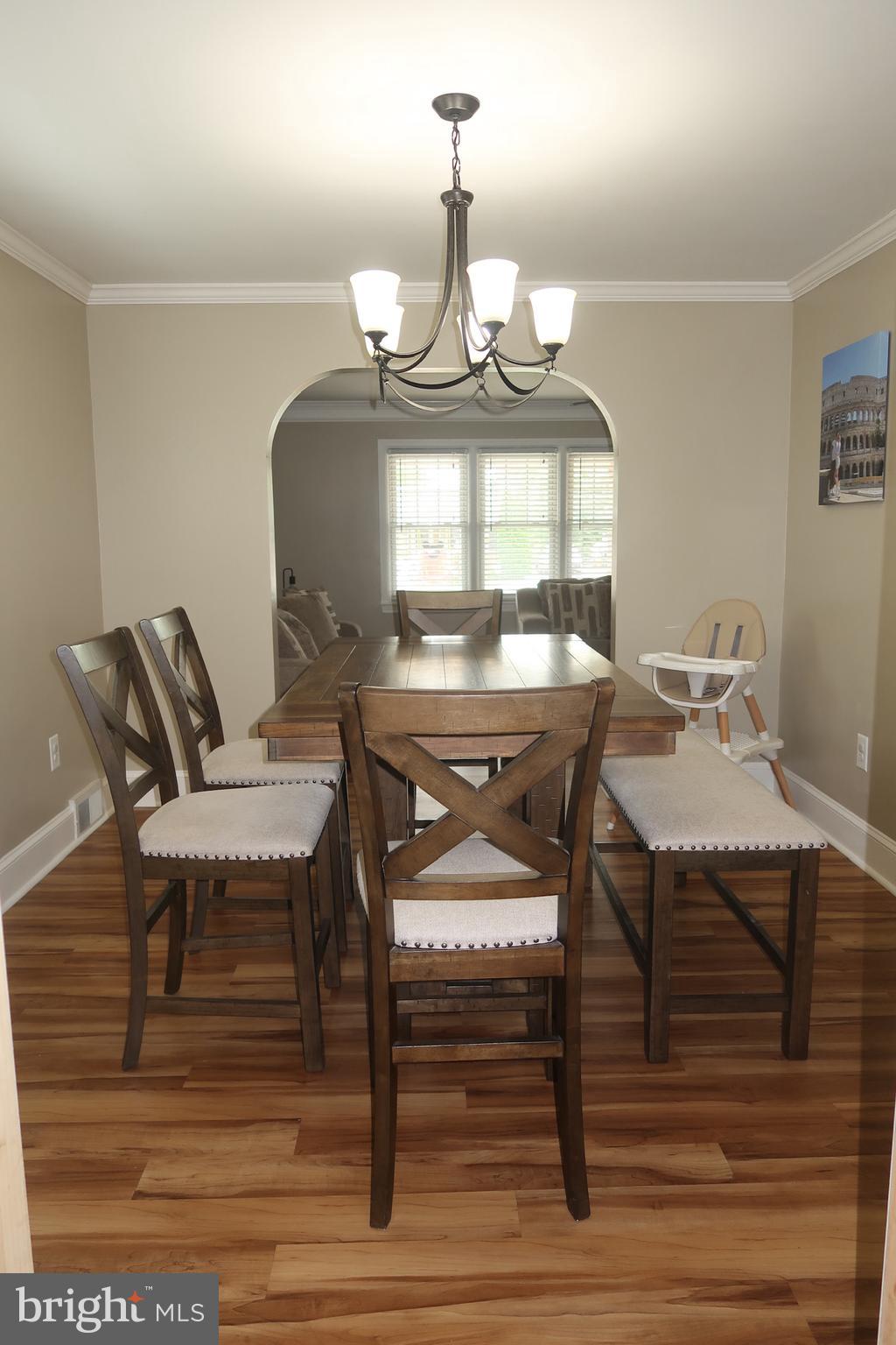 333 Devonshire Road Hagerstown, MD 21740 - Photo 9 of 33 a view of a dining room with furniture window and wooden floor