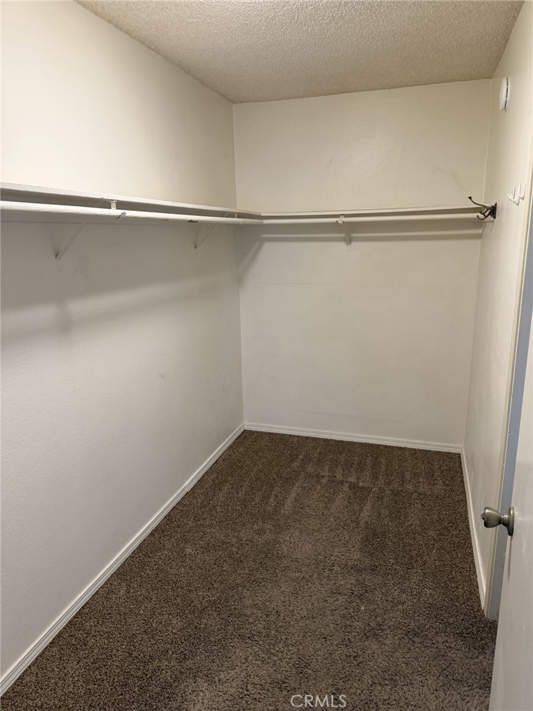 9090 Colony Place, Unit B Riverside, CA 92503 - Photo 14 of 19 a view of a room with shelf