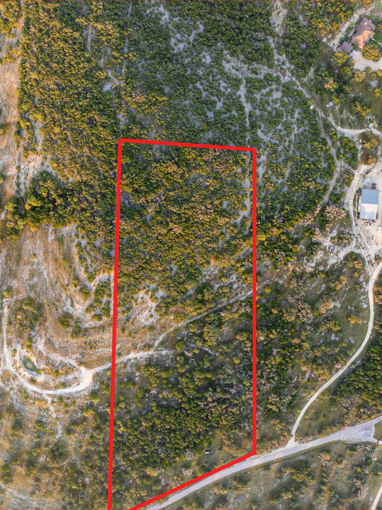 450 South Fork Road East Comfort, TX 78013 - Photo 4 of 36 a street sign that is on the side of a road