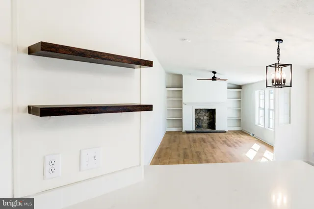 a view of a livingroom with a fireplace