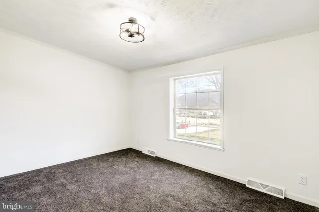 a view of a room with rack on the wall