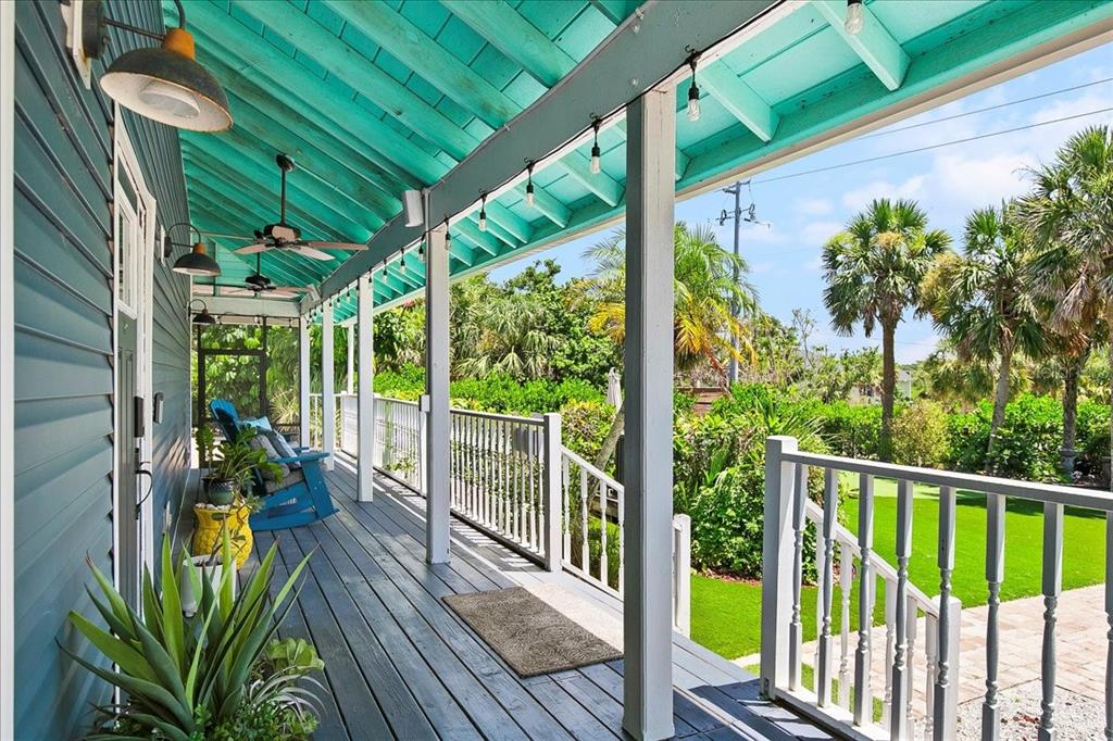 8400 Manasota Key Road Englewood, FL 34223 - Photo 4 of 31 a view of a balcony with wooden floor