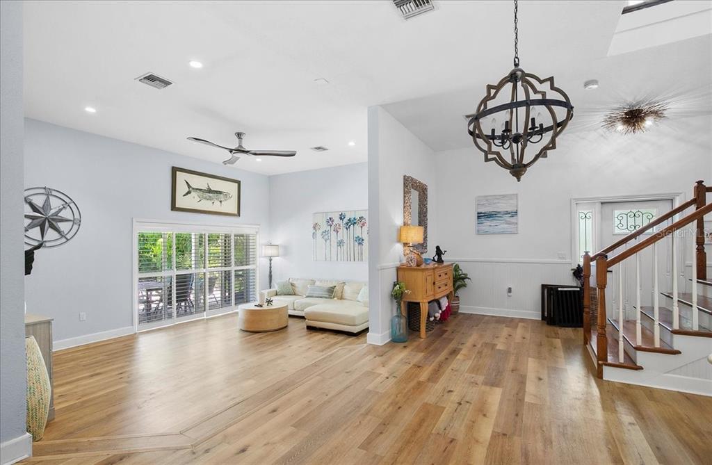 8400 Manasota Key Road Englewood, FL 34223 - Photo 5 of 31 a view of livingroom with furniture and wooden floor