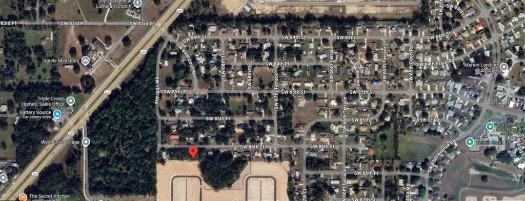 6942 Southwest 86th Street Ocala, FL 34476 - Photo 2 of 8 a close up of a red brick wall