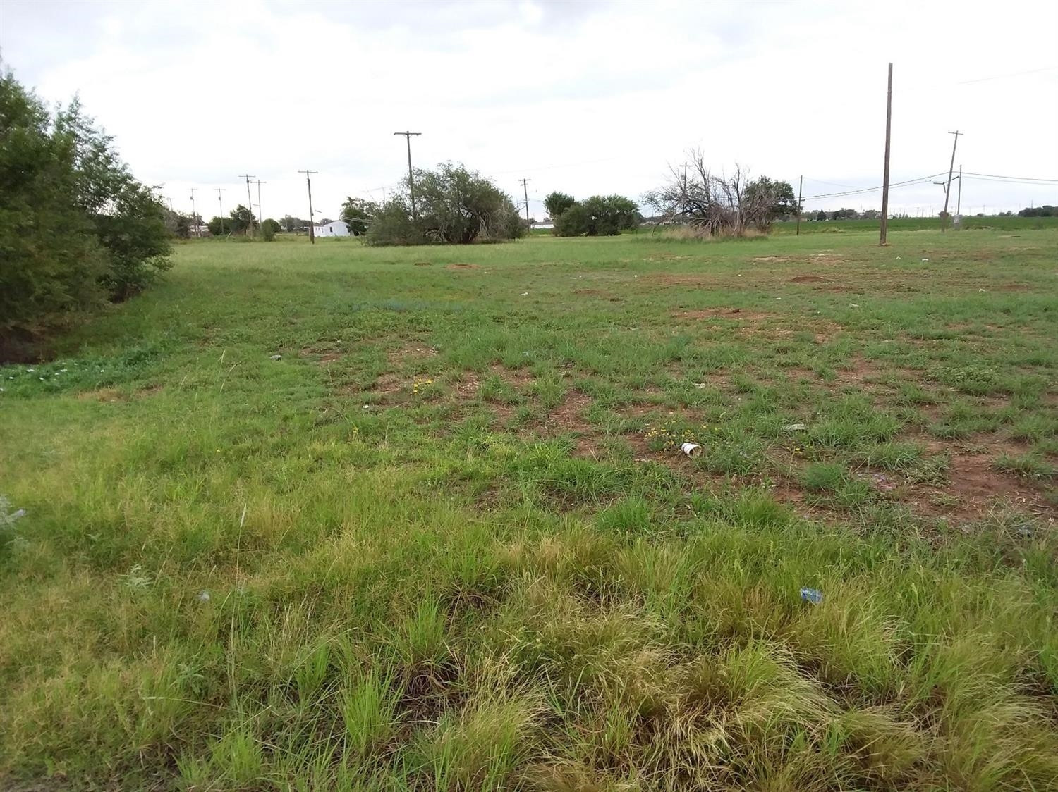 2801 East Broadway Lubbock, TX 79403 - Photo 5 of 6 a view of a green field with clear sky