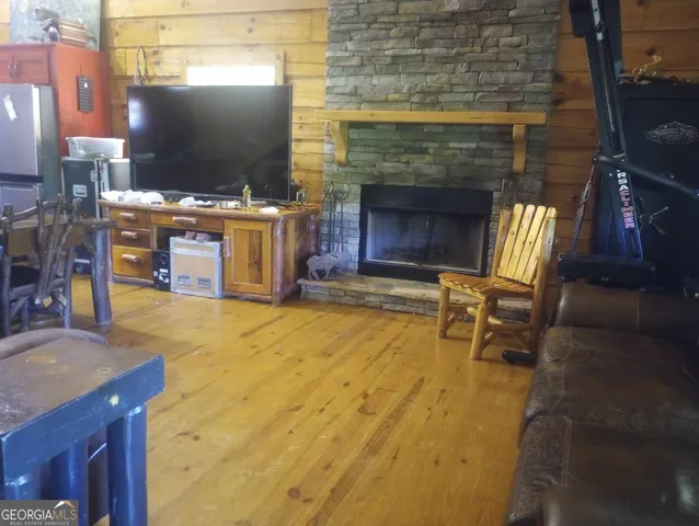 a bedroom with a bed and a night stand