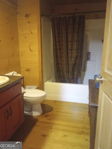 a view of a bathroom with a sink and a washer
