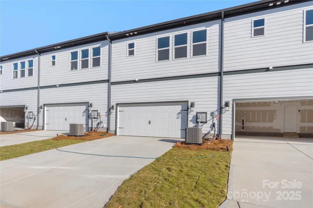a view of house with yard