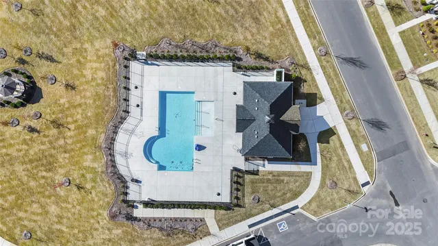 a open kitchen with stainless steel appliances kitchen island granite countertop a sink and cabinets