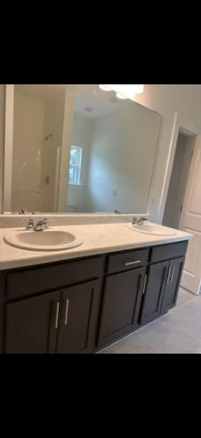 a black and white photo of a sink