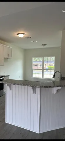 a view of a kitchen with a sink